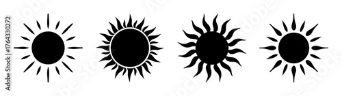 Set of four stylized black sun icons with radiating rays diverse shapes and sizes