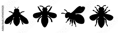 Set of four black bee silhouettes showing different angles and poses insects flying