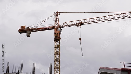 Crane lifts materials at a construction site