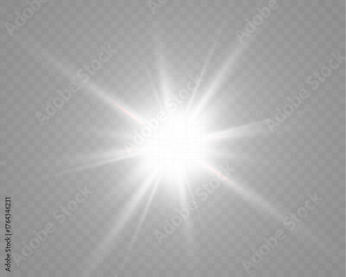 Bright glowing white light flare with rays and soft transparency on dark background.
