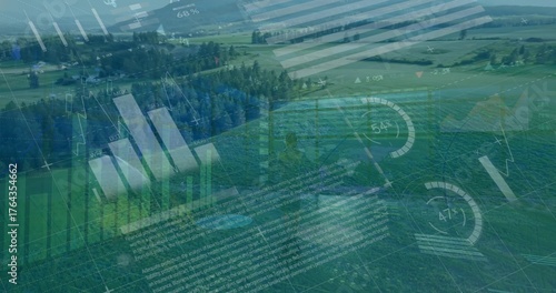 Displaying green crops stretching across rural fields, with digital data overlays and wind turbines