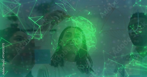 Tech professionals tapping stylus on glass screen in office, showing network mesh and globe overlay