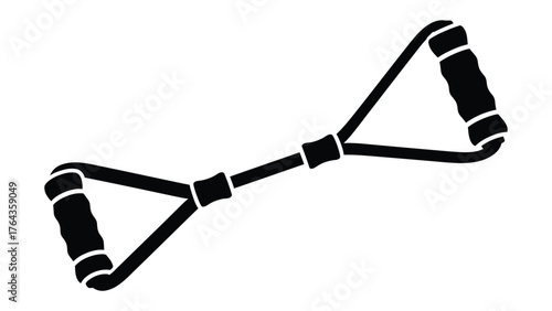 Exercise Band for a Dynamic Workout:  A single black exercise band lies diagonally, poised for a workout, this image encapsulates the essence of fitness and physical exertion.