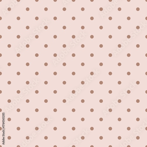 Seamless polka dot pattern on a light pink  backdrop. Features small  dots in pastel shades of brown, chocolate, beige tone. Vintage, confectionery theme, fashion, children’s theme 