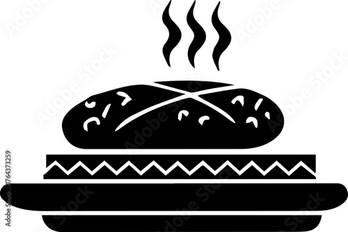 Black and white image of a plate of food with steam rising from it. The plate is placed on a white background. The food appears to be a sandwich, with a piece of meat and some vegetables