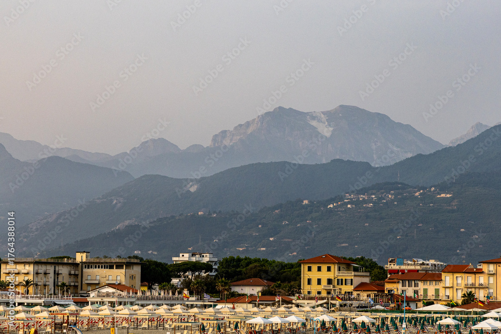 Fototapeta premium Viareggio Italy, panorama of the city and the Mountains. Aerial landscape