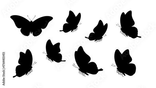Elegant Collection of Flying Butterfly Silhouettes in Dynamic Flight Poses, Perfect for Nature-Inspired Designs and Springtime Projects, Vector Illustration Elements