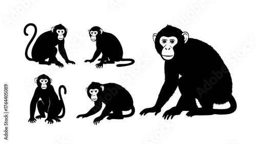 Set of black monkey silhouettes in various poses, perfect for design projects and more