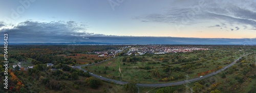 Aerial view of Morfelden Walldorf with Frankfurt skyline at dawn