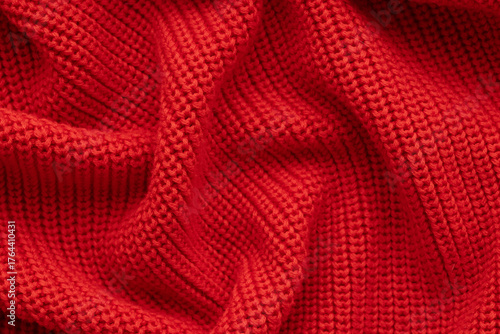 Knitted red background. Top view