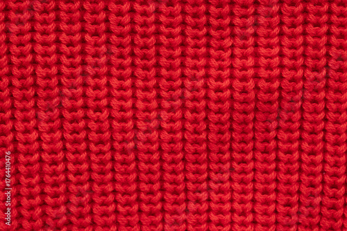 Knitted red background close-up