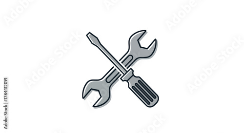 Crossed wrench and screwdriver tools for repair and maintenance work.