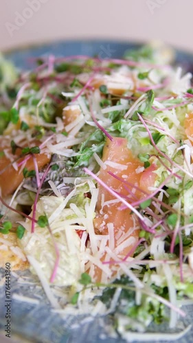 Caesar salad with iceberg lettuce, BBQ turkey, bacon and tuna sauce with Cheese and Prawns from the hotel 5 stars, very appetizing. High quality 4k footage