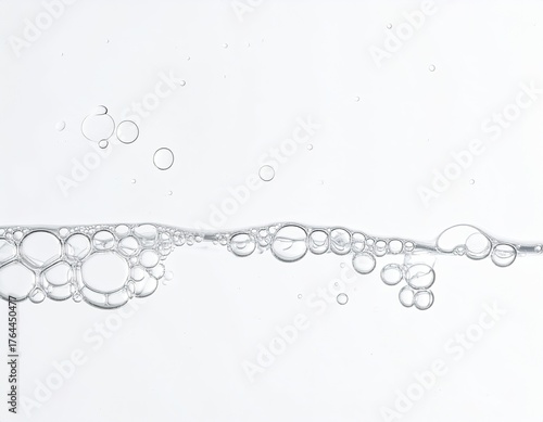 Water line with bubbles; clear, bright, and minimal