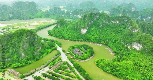 Aerial view of natural scenery at Trang An landscape complex.Trang An is UNESCO World Heritage Site, renowned for its boat cave tours. It's Halong Bay on land of Vietnam. Location in Ninh Binh,Vietnam