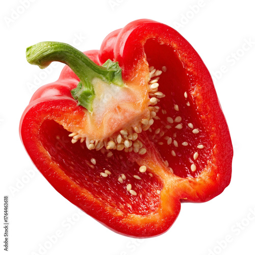 Fresh red bell pepper halved revealing crisp texture and vibrant seeds for culinary use