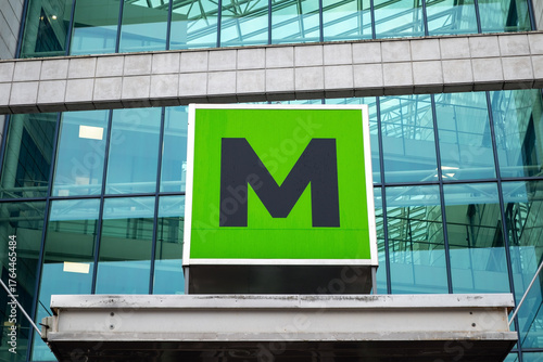 letter M sign on front of office building