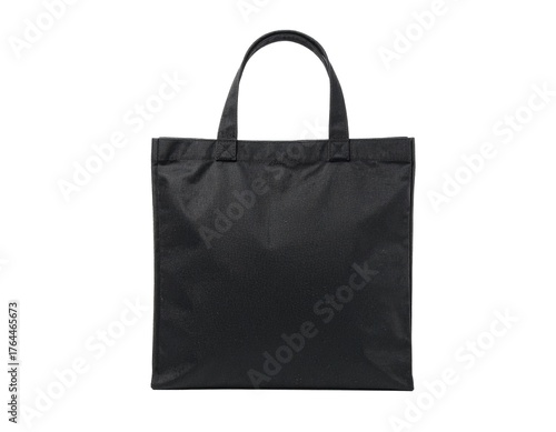 Black tote bag displayed against a white seamless backdrop