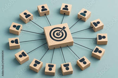 Collaborative team members align their efforts towards a central target, symbolizing shared strategic goals within a modern teal network