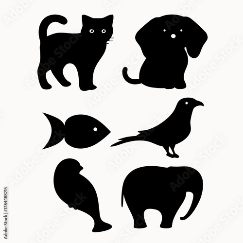 Silhouette collection featuring a cat dog fish bird and elephant animal designs in black and white style