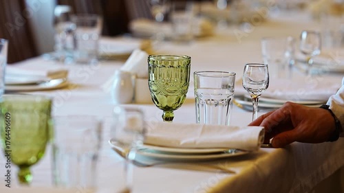 Setting a dining table for an elegant meal gathering