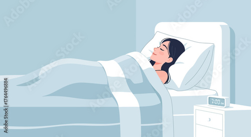 Woman sleeping peacefully in bed under the covers at night.