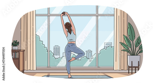 Woman balancing in yoga pose with arms raised indoors near window.