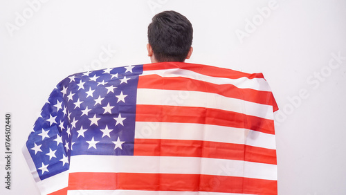 Asian Fat Man holding USA flag at studio against white background.