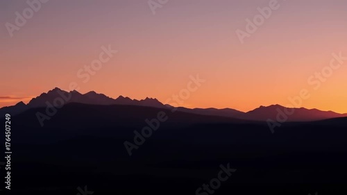 Wallpaper Mural Silhouetted mountain range at sunset against colorful sky landscape Torontodigital.ca