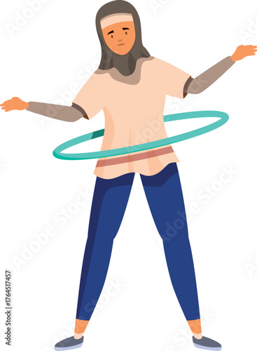 Young athletic woman wearing hijab is using hula hoop, having fun and enjoying physical activity