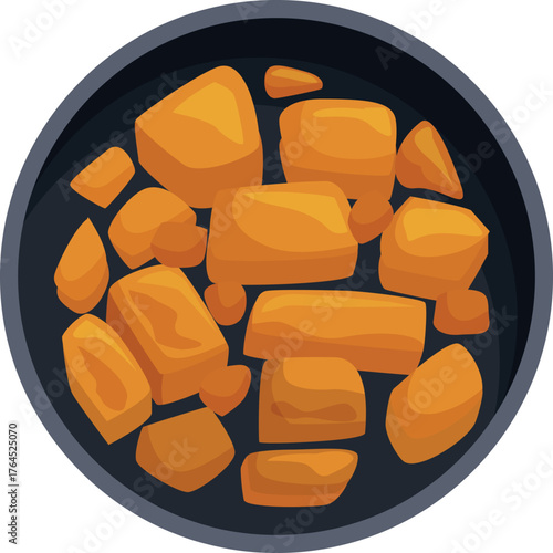 Sweet potato cubes roasting in a frying pan, viewed from above