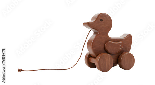 BABY TOYS - Brown wooden pull toy duck on wheels isolated on white background, classic children?s toy perfect for early learning