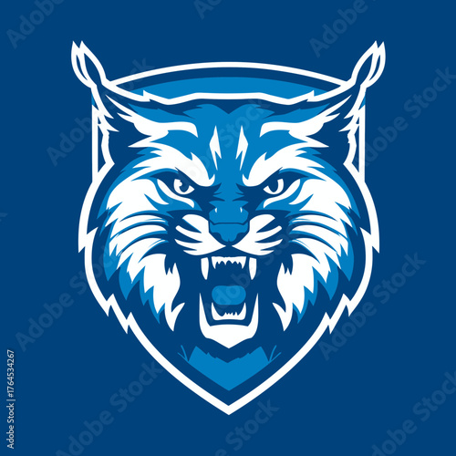 Fierce Blue Wildcat Head Mascot Illustration on Shield, Dynamic Feline Emblem for Sport Team Strength and Power Concept