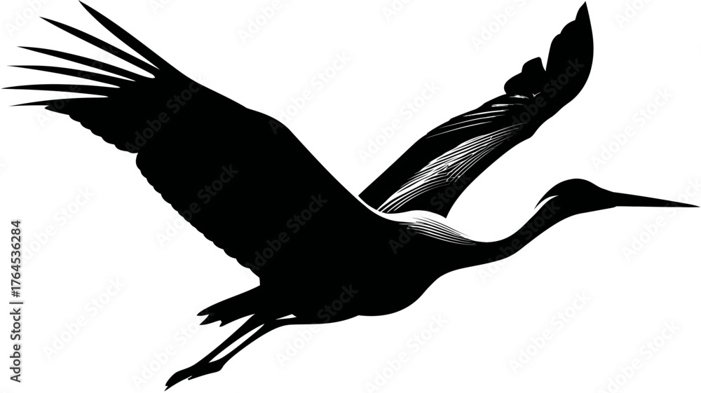 Fototapeta premium Striking black silhouette of a large bird in graceful flight, wings spread wide, isolated on a pure white background, symbolizing freedom and motion.