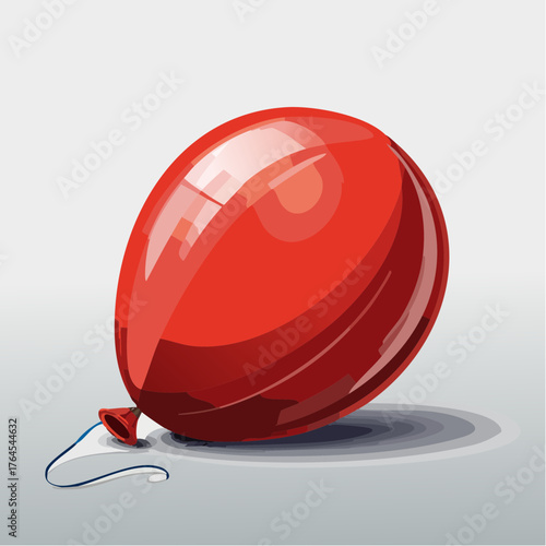 A vibrant red balloon is completely deflated and shriveled, lying flat on a stark, empty floor.