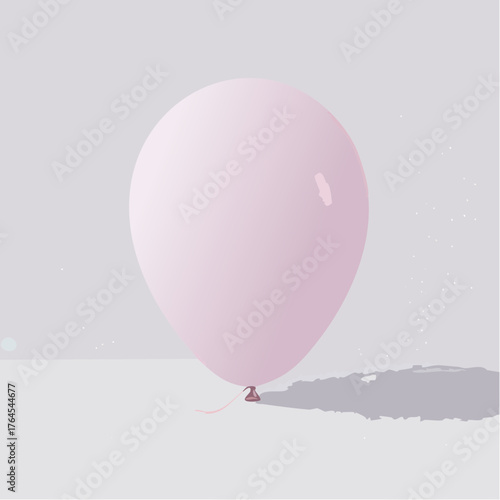 A deflated balloon resting on a blank, flat surface surrounded by faint specks of glitter.