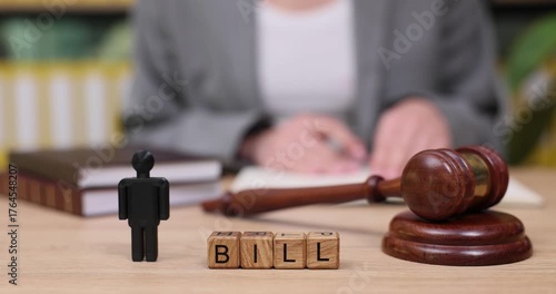 Exploring the legislative process with a gavel and bill in focus at a busy law office