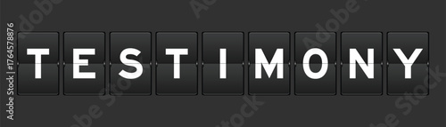 Black color analog flip board with word testimony on gray background