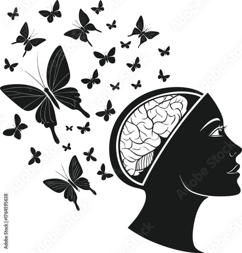 Silhouette of a woman's head with butterflies emerging as thoughts or dreams concept isolated on transparent background