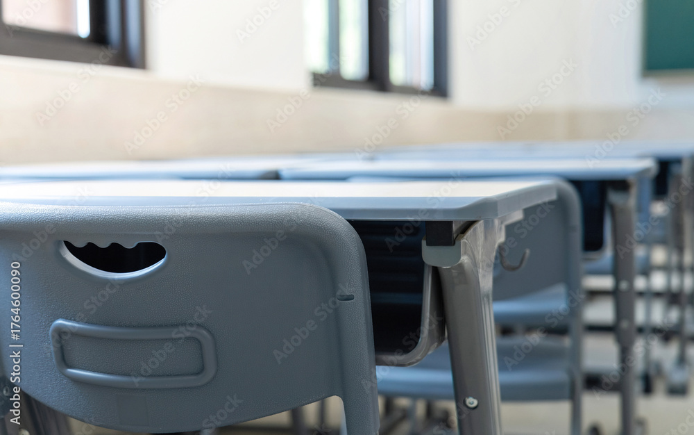 Fototapeta premium Tables and chairs in the school classroom