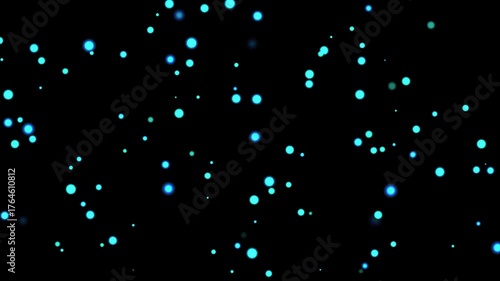 Seamless loop of soft glowing blue particles drifting and floating in space