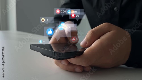 Interactive with friends on chat with emoticon feedback.Social media,marketing, like,social network,blog,live,chat reaction and livestream.Person using smart phone with emoticon icons of Social Media.