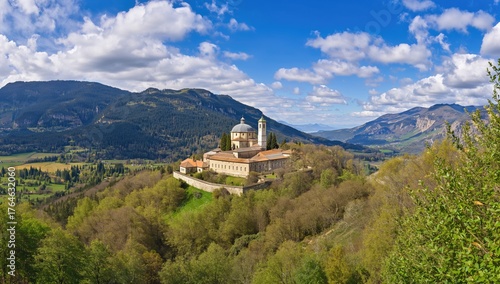 Wallpaper Mural Wide-angle perspective of an ancient religious cloister surrounded by forest and mountains in spring Torontodigital.ca