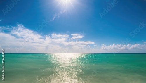 Wallpaper Mural Extended exposure capture of clear blue sky and tranquil green ocean, deserted scene with vignette effect Torontodigital.ca