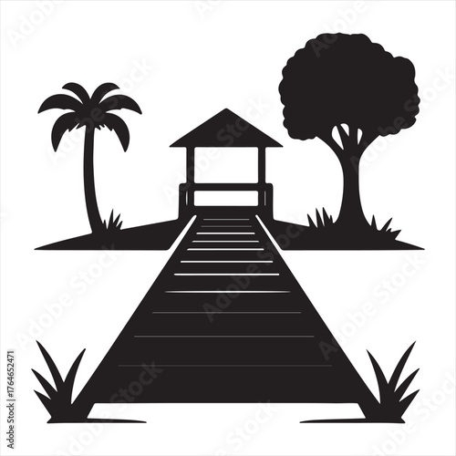 Silhouette of a tropical boardwalk leading to a gazebo with palm and evergreen trees