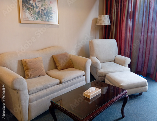 The classic style hotel room interior with table lamps beside the wooden bed, creates a warm and comfortable atmosphere for resting.