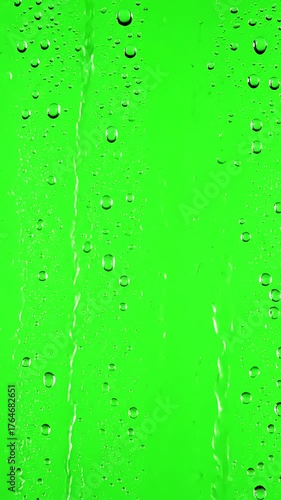 Atmospheric Window Overlay with water rainfall rain drops falling on glass over chroma key green screen distortion, overlay, glitch, static noise, scan lines black background, 4k animated video loop