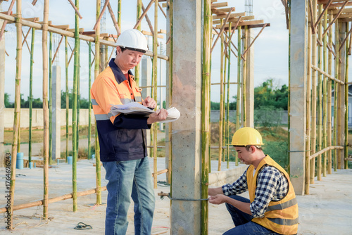 Diverse Team of Specialists Use Tablet Computer on Construction Site. Real Estate Building Project with Civil Engineer, Architect, Business Investor and General Worker Discussing Plan Details.