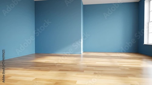 Interior view of an empty room featuring blue walls, hardwood floor, and a window