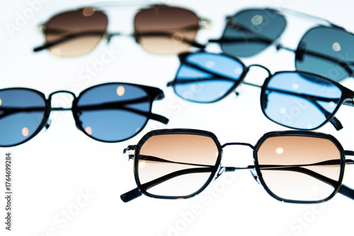 Many sunglasses are displayed in the store